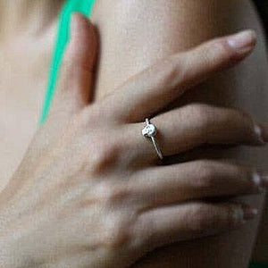 Ring - Diamond-Eyed Tiny Skull Face in Sterling Silver by Michelle Chang