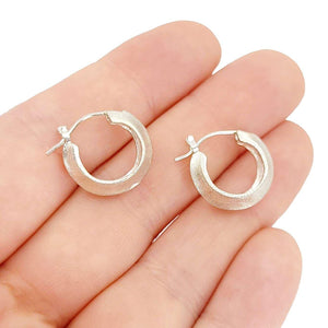 Earrings - Morph Huggie Hoops (Sterling Silver) by Corey Egan