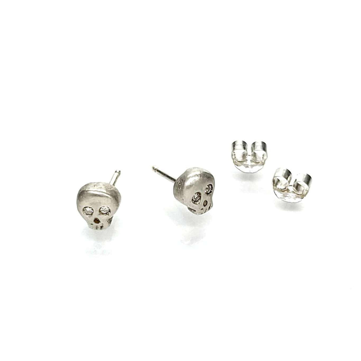 Earrings - Diamond-Eyed Tiny Skull Studs in Sterling Silver by Michelle Chang