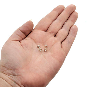Earrings - Asymmetric Star Cutout Studs in Sterling Silver by Michelle Chang