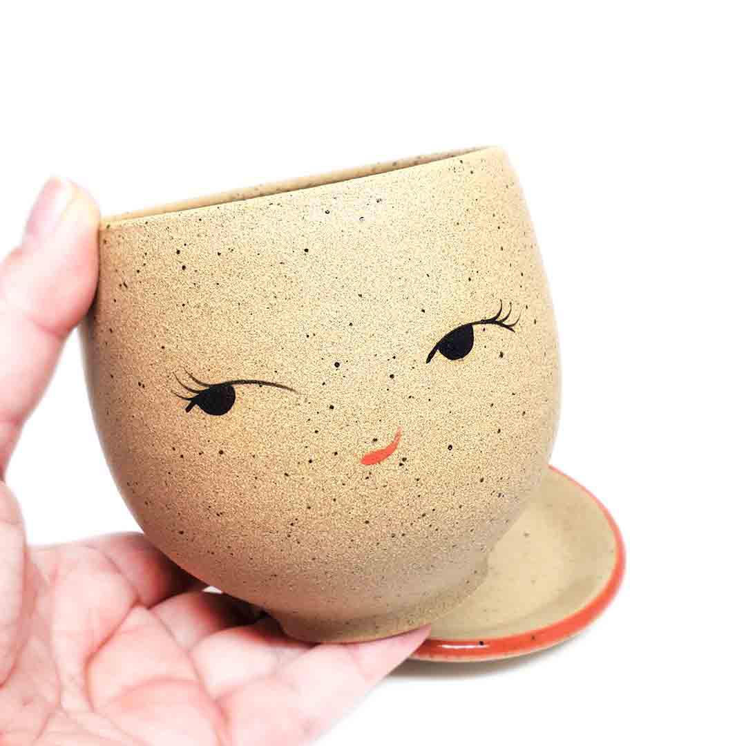 Planter - Coy Face (Red Saucer) by Jennifer Fujimoto