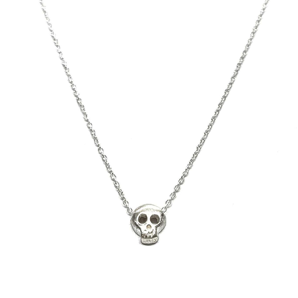 Necklace - Open-Eyed Tiny Skull in Sterling Silver by Michelle Chang