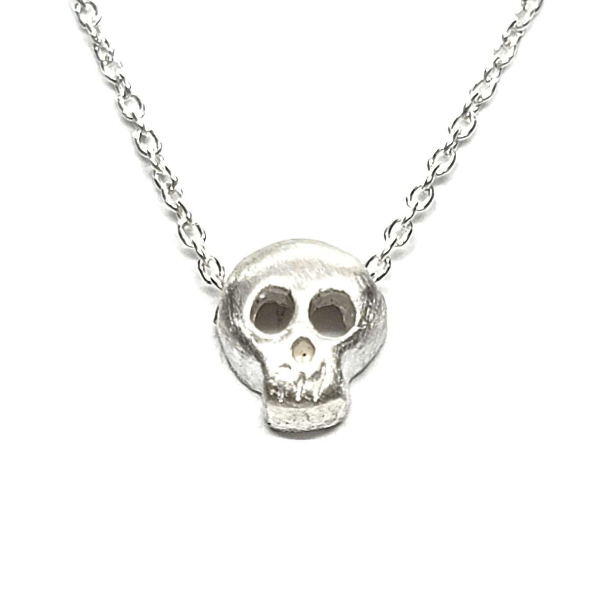 Necklace - Open-Eyed Tiny Skull in Sterling Silver by Michelle Chang